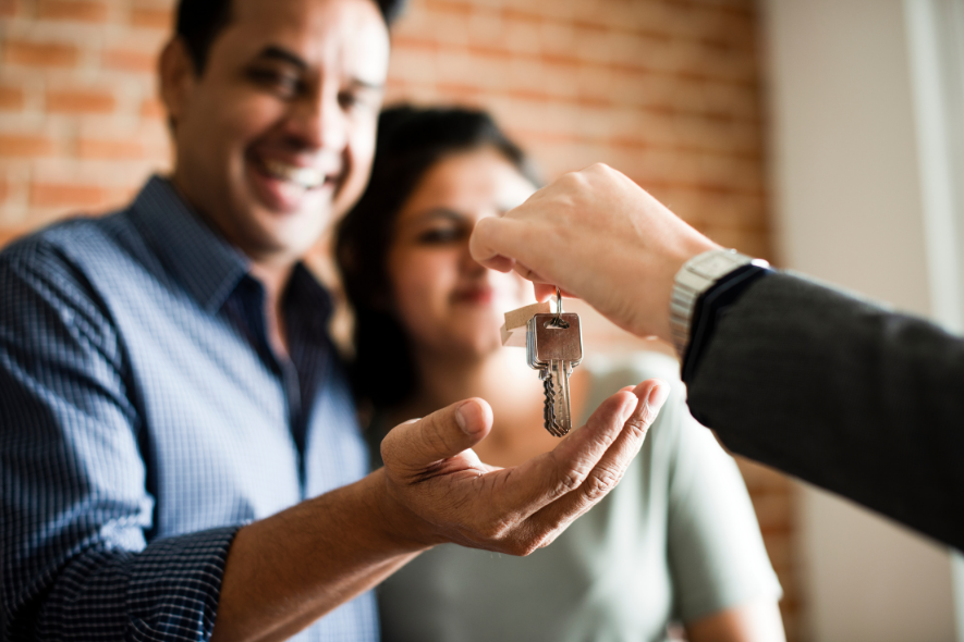 couple getting their home keys