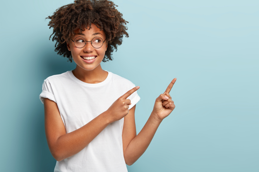 happy black woman pointing