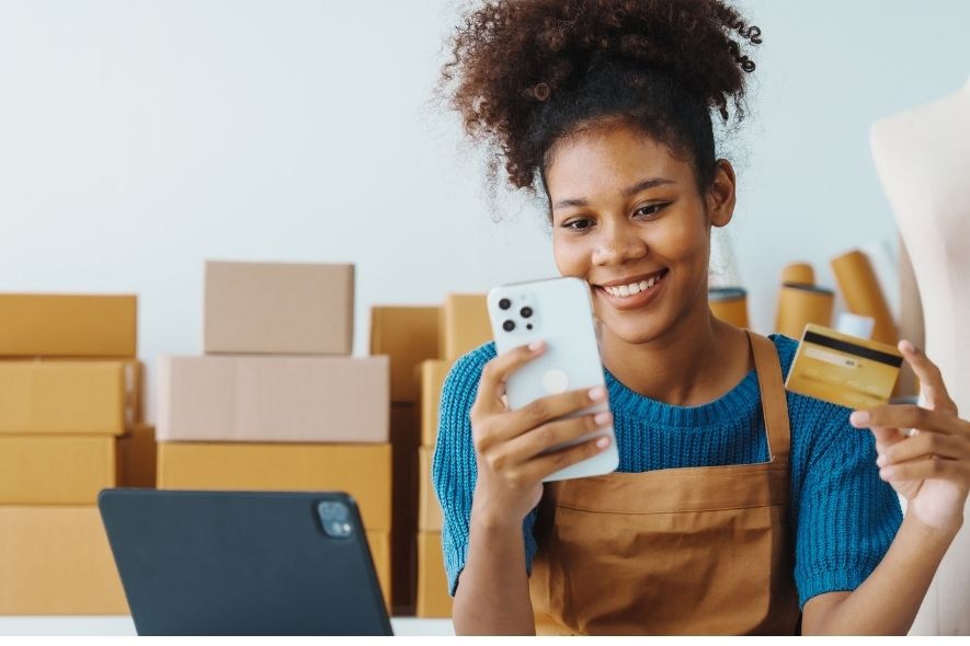 woman holding a credit card