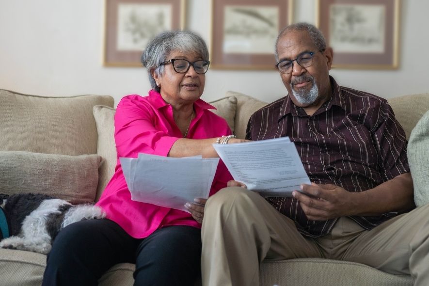 older couple doing paperwork