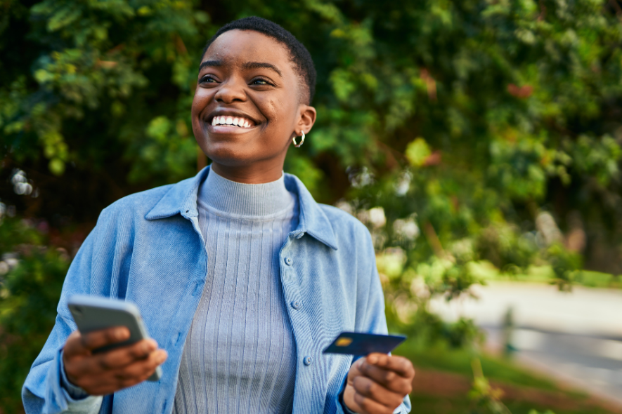 black woman with credit card