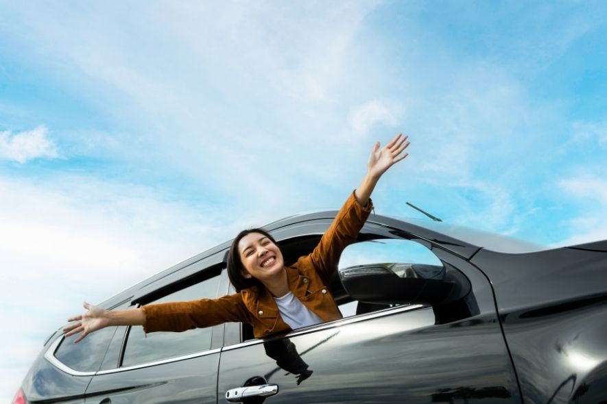 happy person in a car