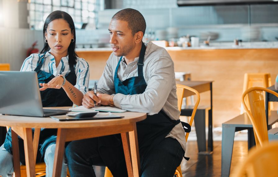 two small business owners